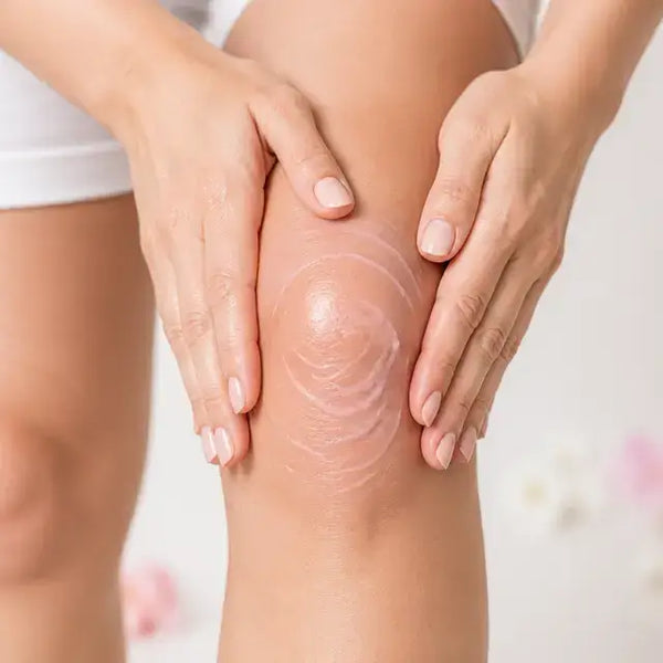Scoop, apply and massage Murvano Miracle Balm into the knee